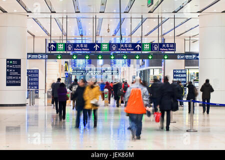 BEIJING, DEC. 29, 2011. Passengers at Beijing South Railway Station on Dec. 29, 2011. It is the second largest railway station of Asia. Stock Photo