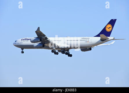 BEIJING-DEC. 9. Lufthansa Airbus A340-313X, D-AIFD landing. Airbus A340 is a long-range four-engine wide-body commercial passenger jet airliner. Stock Photo