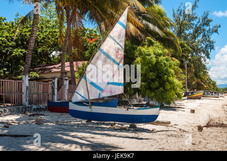 Ramena, Madagascar - December 20, 2015: Traditional Malagasy wooden fishing sail boats on the sea coast, Madagascar, East African Islands, Africa. Stock Photo