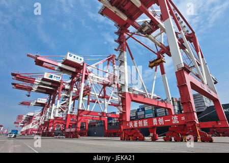 A container terminal at Qingdao Port in east China's Shandong Province ...