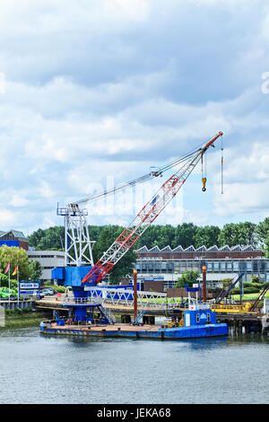ROTTERDAM-AUG. 7, 2012. Van Brink Crane pontoon. Van Brink is one of the largest Damen shipyards on maintenance in Port of Rotterdam. Stock Photo