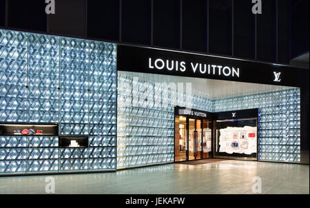 SHANGHAI-JUNE 4, 2014. Louis Vuitton outlet at Lujiazui. Western luxury brands are popular in China with a growing wealth-class. Stock Photo