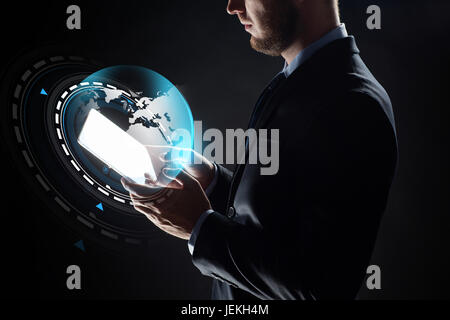 close up of businessman with transparent tablet pc Stock Photo