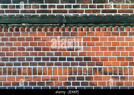 A wall made of bricks with white interstice Stock Photo
