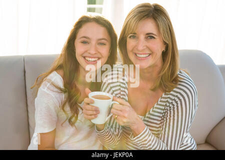 Mother and daughter drink tea Stock Photo