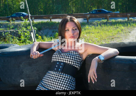 Attractive girl with spanner wrench in hands Stock Photo