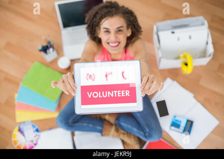 Composite image of grey volunteer Stock Photo