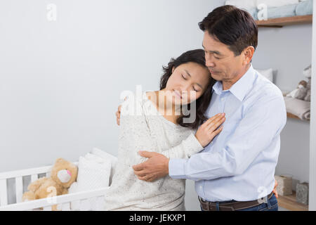 Sad couple embracing Stock Photo