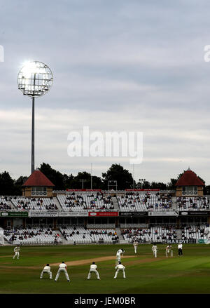 A general view of the action under floodlights during the Specsavers County Championship, Division Two match at Trent Bridge, Nottingham. Stock Photo