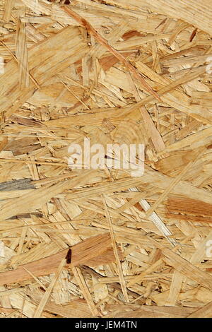 oriented strand board (osb) as a background texture Stock Photo