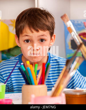 Small students boy painting in art school class Stock Photo - Alamy