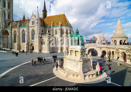 BUDAPEST, HUNGARY - FEBRUARY 20, 2016: Matthias Church is a Roman Catholic church located in Budapest, Hungary, in front of the Fisherman's Bastion at Stock Photo