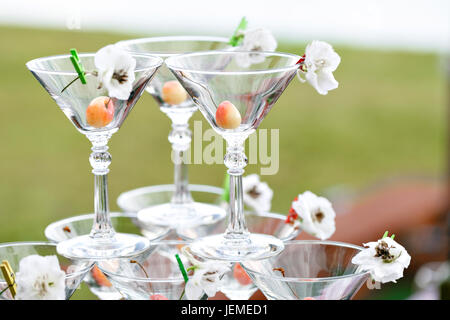 Champagne tower ready to spill alcohol Stock Photo