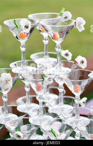 Champagne tower ready to spill alcohol Stock Photo