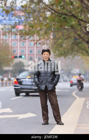 Portrait of a Chinese senior. China’s elderly population (60 years or older) is currently 128 million, one in every ten people, largest in the world. Stock Photo