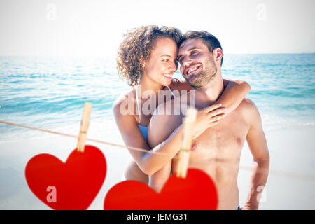 Composite image of happy couple smiling Stock Photo