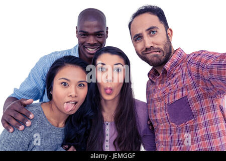 Happy multi-ethnic friends making a face Stock Photo