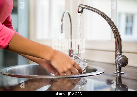 Close up of woman washing glass Stock Photo