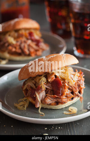 homemade pulled pork burger with caramelized onion and bbq sauce Stock Photo