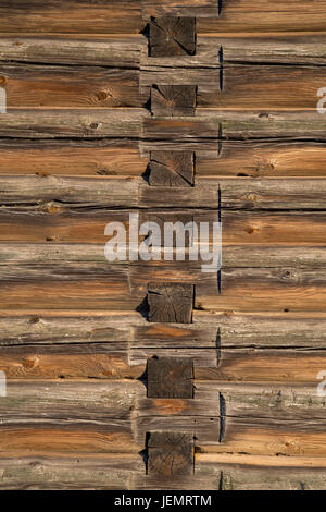 Old Log Cabin Wall Texture. Dark Rustic House Log Wall. Horizontal Timbered Background. Stock Photo