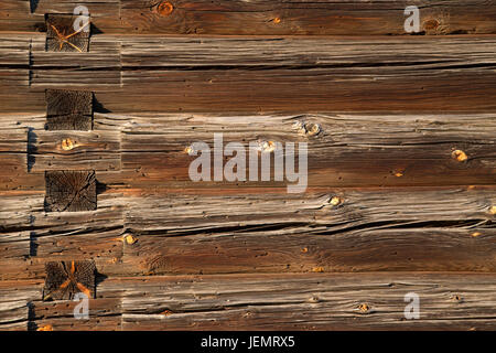 Old Log Cabin Wall Texture. Dark Rustic House Log Wall. Horizontal Timbered Background. Stock Photo