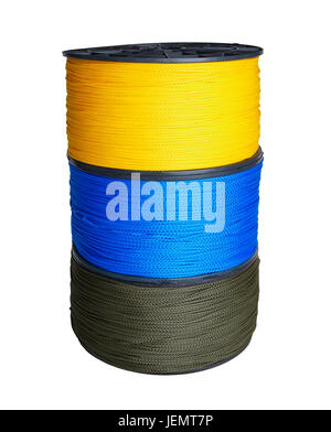 Column of three skeins of synthetic rope of yellow, blue and green colors isolated on white background Stock Photo
