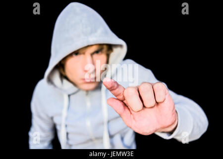 Man in hood jacket Stock Photo