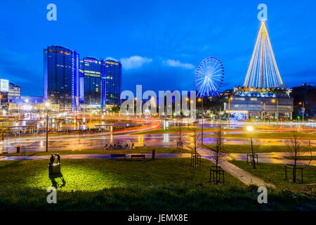 Illuminated cityscape with Ferris wheel Stock Photo