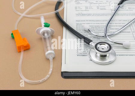 Test medication and stethoscope, administration of serum system Stock Photo