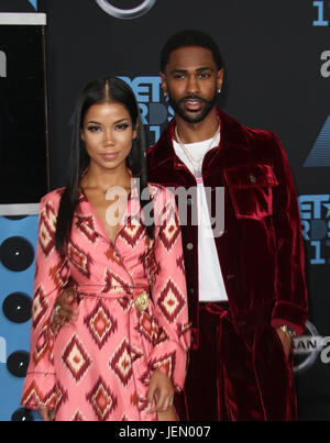 Big Sean departs from the airport with his girlfriend Jhene Aiko