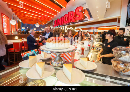 New York, USA. 26th June, 2017. Display of cheesecakes at the ceremonial ribbon cutting of the second Times Square branch of Junior's Restaurant. in the former Ruby Foo's space, on Monday, June 26, 2017. The original Junior's is located in Downtown Brooklyn and is beloved for it's famous cheesecake. Junior's has opened a second space in Times Square in the now closed Ruby Foo's location. The new restaurant seats 300 people. ( © Richard B. Levine) Credit: Richard Levine/Alamy Live News Stock Photo