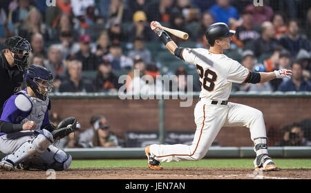 San Francisco, California, USA. 26th June, 2017. Swinging hard, lead off hitter of the fifth inning, San Francisco Giants catcher Buster Posey (28), during a MLB baseball game between the Colorado Rockies and the San Francisco Giants on LGBT Night at AT&T Park in San Francisco, California. Valerie Shoaps/CSM/Alamy Live News Stock Photo