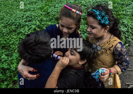 (170628) -- KOLKATA (INDIA), June 28, 2017 (Xinhua) -- Afghan children living in India play as they celebrate Eid al-Fitr in Kolkata, capital of Indian state West Bengal, June 27, 2017. (Xinhua/Tumpa Mondal) (zjy) Stock Photo