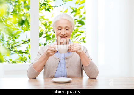 happy senior woman with cup of coffee Stock Photo