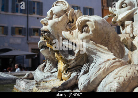 Fountain on the Fontana del Pantheon in Rome, Italy, closeup of the sculptures. Stock Photo