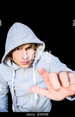 Man in hood jacket Stock Photo