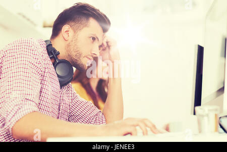stressed software developer at office Stock Photo