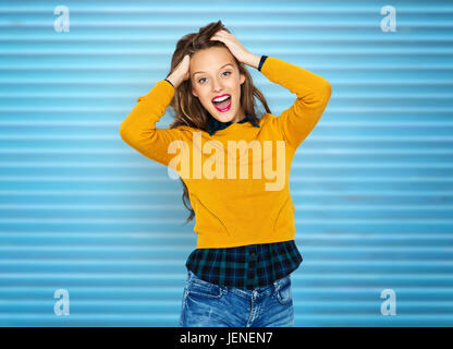 happy young woman or teen girl in casual clothes Stock Photo