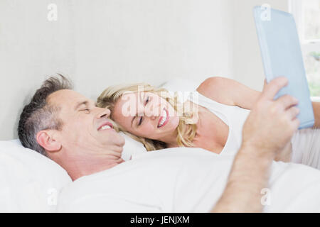 Cute couple using tablet Stock Photo