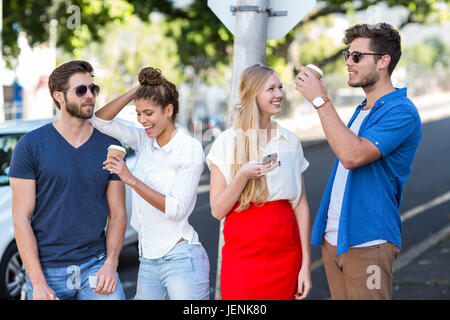 Hip friends spending time together Stock Photo