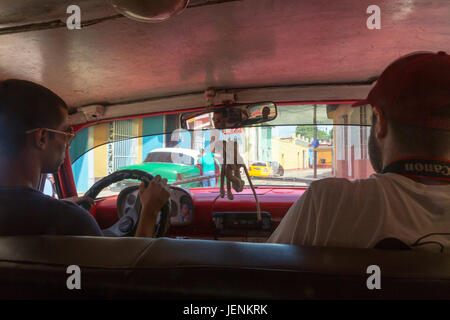 Ride in a cuban taxi in Trinidad, Cuba Stock Photo