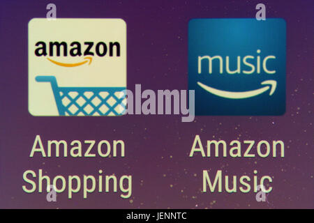 A closeup of the Amazon Shopping and Amazon Music apps on a smartphone screen Stock Photo