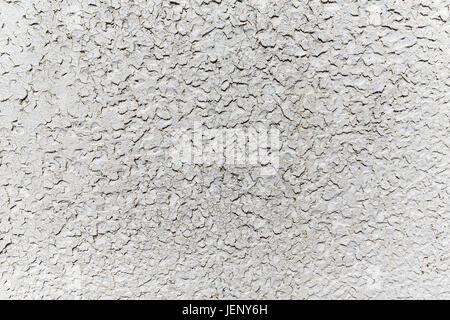 Uneven white grunge concrete wall texture background Stock Photo