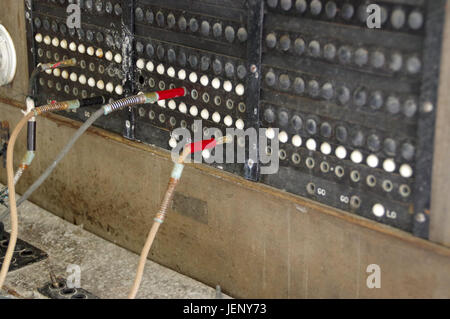 Cables and switches of the old telephone exchange Stock Photo