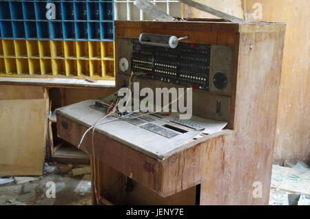 An old telephone exchange in an abandoned hotel reception Stock Photo