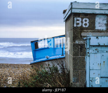 Abandoned fishing boat left to rot and decay on the beach at Dungeness ...