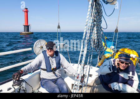 Senior men on boat Stock Photo