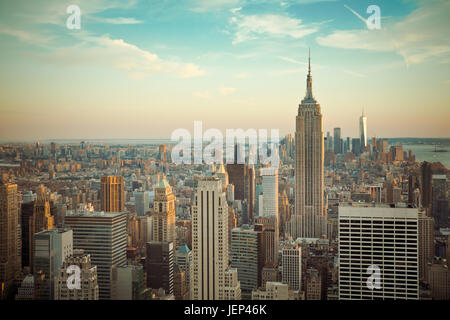 View of New York City skyline seen from midtown Manhattan looking downtown. This image has vintage tone filter. Stock Photo