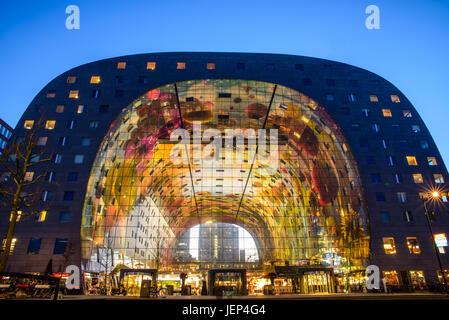 Exterior night view of the new and colored Market Hall (Markthal in Dutch), located in the Blaak district in Rotterdam,