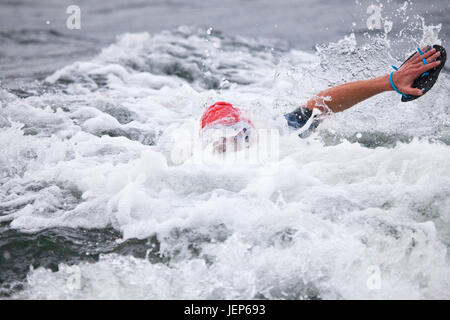 Person swimming in river Stock Photo